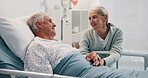 Senior woman, man and holding hands in hospital bed for care, love or support for healing process. Elderly people, couple and kindness for trust, smile or visit patient for rehabilitation at clinic