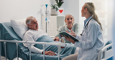 Buy stock photo Hospital bed, doctor and senior man with wife for support, comfort or empathy with medical diagnosis. Conversation, healthcare and elderly male patient with woman and surgeon for feedback on surgery.