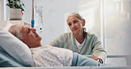 Hospital bed, healthcare and woman with husband for support, comfort or empathy with visit. Love, marriage and senior male patient with wife for compassion with medical recovery or healing in clinic.