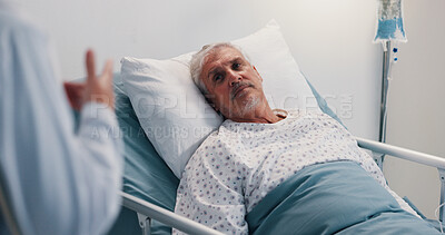 Buy stock photo Doctor, consulting and senior man in hospital bed for advice, feedback or healthcare diagnosis. Conversation, medical update and patient listening to medicine professional in clinic for recovery