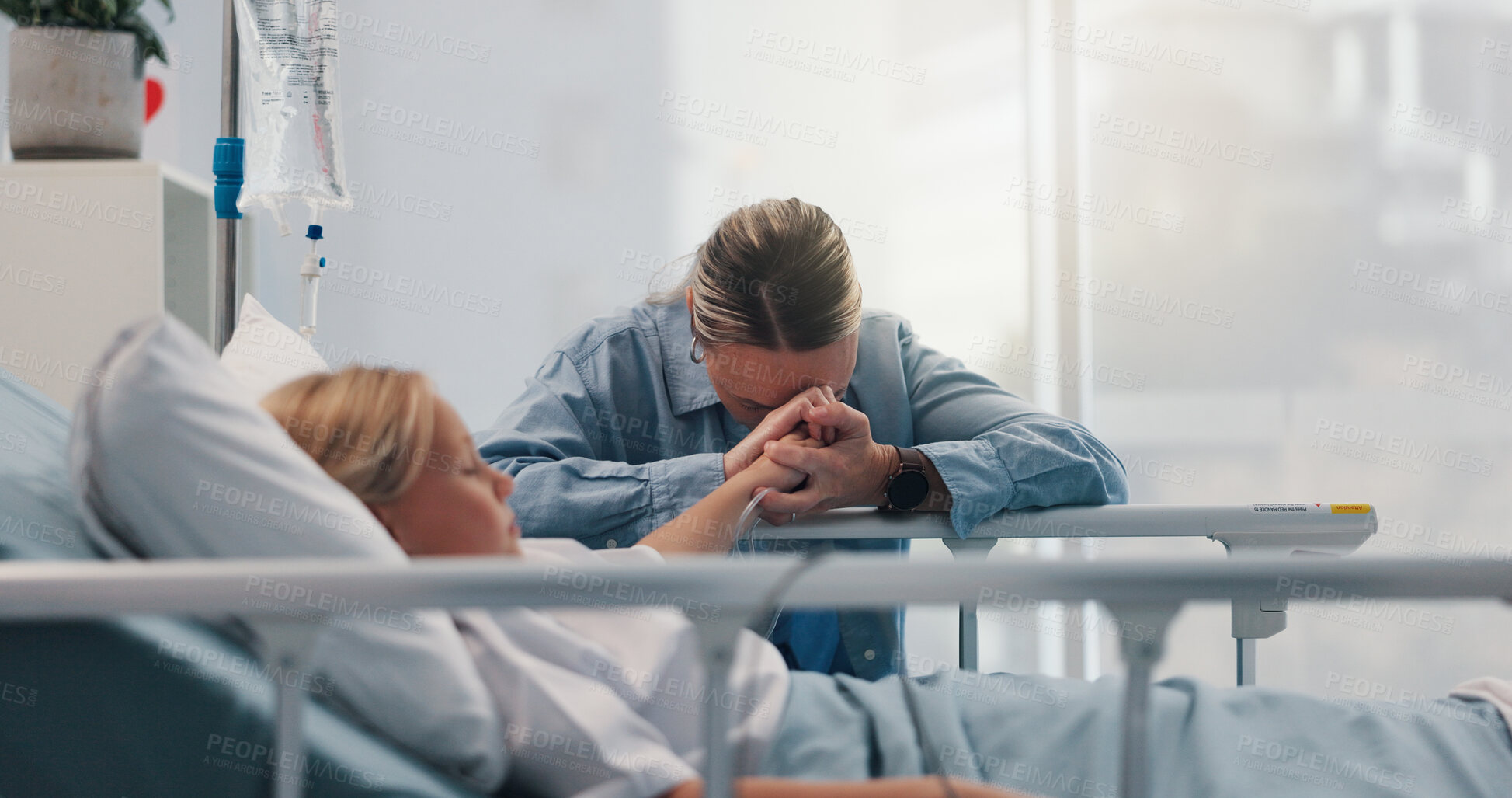Buy stock photo Healthcare, mother and praying with daughter in hospital bed for recovery from operation or surgery. Faith, fear and trust with single parent woman and girl child in clinic for medical procedure hope