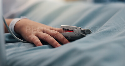 Buy stock photo Hand, child and pulse oximeter on hospital bed to measure blood levels, monitor and recovery. Closeup, young patient and resting with medical machine, track oxygen and critical care from procedure