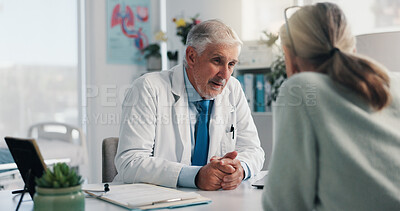 Buy stock photo Woman, mature doctor and discussion in clinic for medical services, consultation or opinion. People, symptoms and patient in conversation for appointment, checkup and healthcare with treatment advice