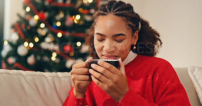 Buy stock photo Relax, coffee and woman on sofa for Christmas in home smelling aroma of latte in living room. Smile, peace and female person drinking eggnog for xmas eve with calm festive holiday in apartment.