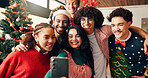 Christmas, selfie and social media with happy friends in living room of home for celebration together. December, holidays and smile with group of people in apartment for memories or profile picture