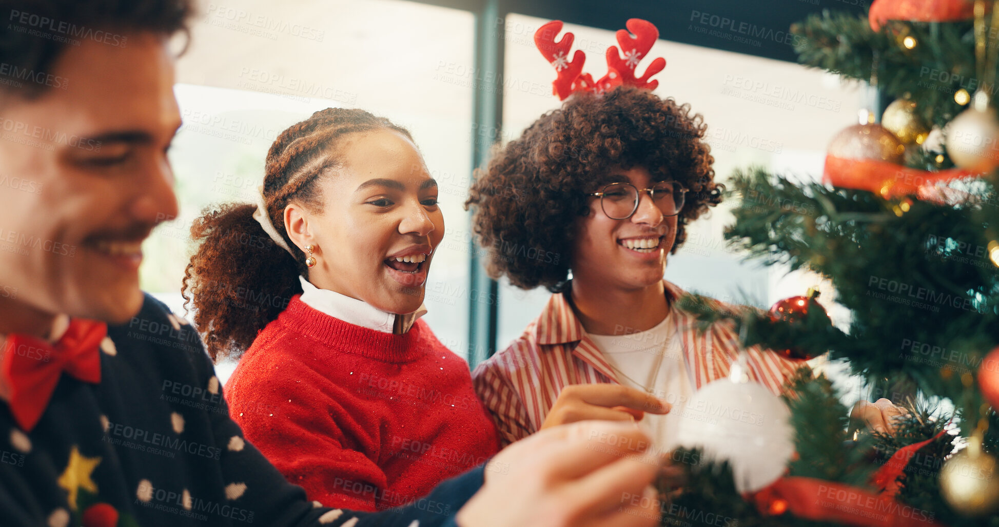 Buy stock photo Christmas tree, decoration and teamwork with friends in home living room for social celebration. December, gathering and ornament with group of happy people in apartment together for holiday season