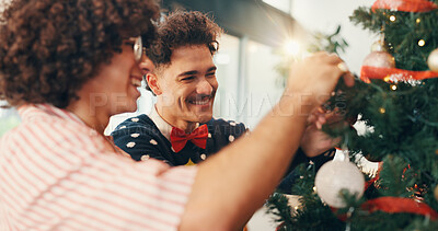 Buy stock photo Happy men, Christmas and tree with decor for festive celebration or December holiday in home. Male people, friends or smile with Santa decorations, ornaments or bauble for new year, event or party