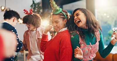 Buy stock photo Christmas, dance and party with friends in home for celebration, festive season and laugh. Bonding, xmas holiday and reunion with group of people in living room for entertainment and social event