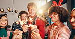 Excited people, christmas and celebration with fireworks for new year or festive season in home. Happy, group or friends with smile or sparklers in joy for party, event or december holiday at house