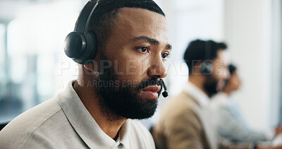 Buy stock photo Serious, profile and man in call center for technical support, IT solution or coworking. Headset, problem solving and operator think of virtual troubleshooting, software query or customer complaint