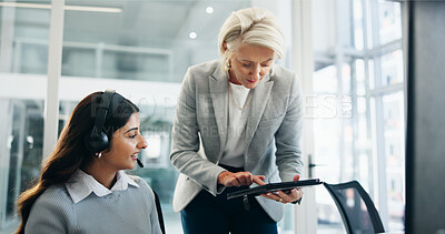 Buy stock photo Call center, mentor and women with tablet, help desk and contact us with corporate training. Employees, coaching and consultant in office, friendly service and telecom sales with questions and advice