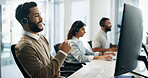 Computer, smile and support with man in call center for assistance, conversation or solution. Contact us, coworking and headset with happy agent in office for customer service or problem solving