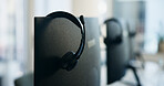 Empty, headset and computer in office at call center for contact us, customer service and consulting. Equipment, desktop and monitor for virtual assistance, tech support and crm at insurance agency