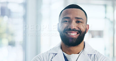 Buy stock photo Doctor, man and portrait with smile at hospital for career, pride and services at healthcare center. Person, medical professional and happy with job for wellness, advice and face at clinic in Cuba