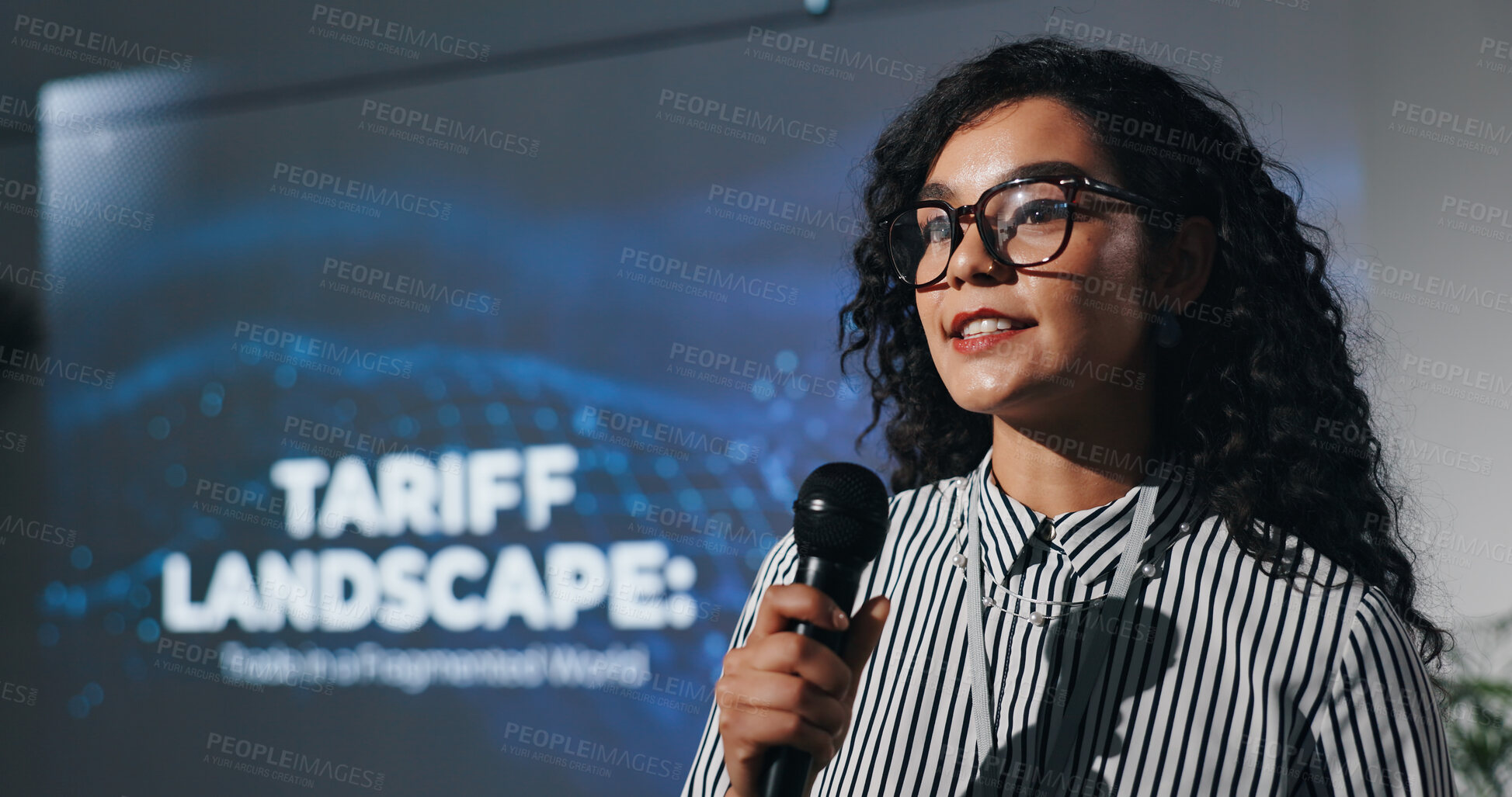 Buy stock photo Microphone, seminar and speech with business woman in auditorium for presentation in tariff landscape. Development, symposium and workshop with guest speaker on podium or stage for tax conference