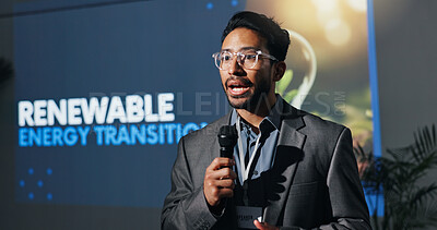 Buy stock photo Man, speaker and mic with speech at conference for renewable energy transition at seminar. Person, public speaking and awareness for climate change, eco friendly solution and expo for hydrogen fuel