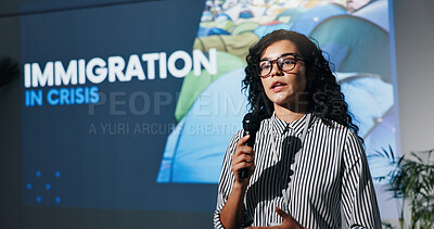 Buy stock photo Woman, speaker and mic at conference event for awareness, speech and immigration crisis. Person, public speaking and solution for permanent residence, economic migrant and information for settlement
