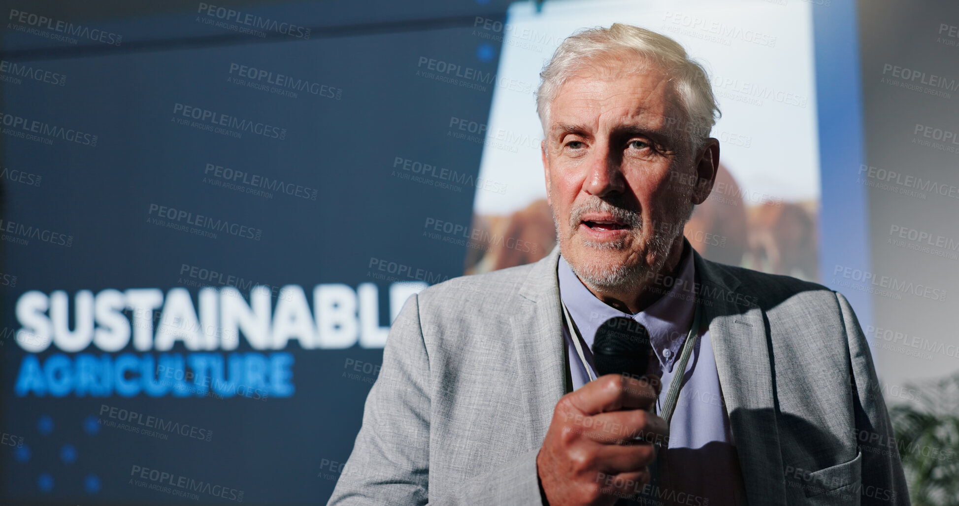 Buy stock photo Microphone, seminar and speech with business man in auditorium for sustainable agriculture. Development, presentation and symposium with mature speaker on podium or stage for farming conference
