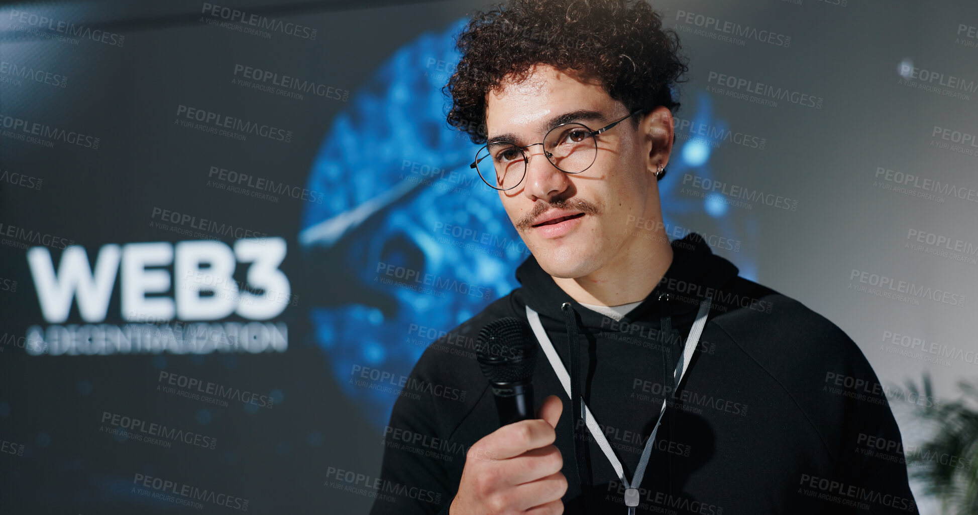 Buy stock photo Business, seminar and speech with man in auditorium for presentation on web3 development. Mic, event and stage with speaker for intro to blockchain technology or decentralization of user experience