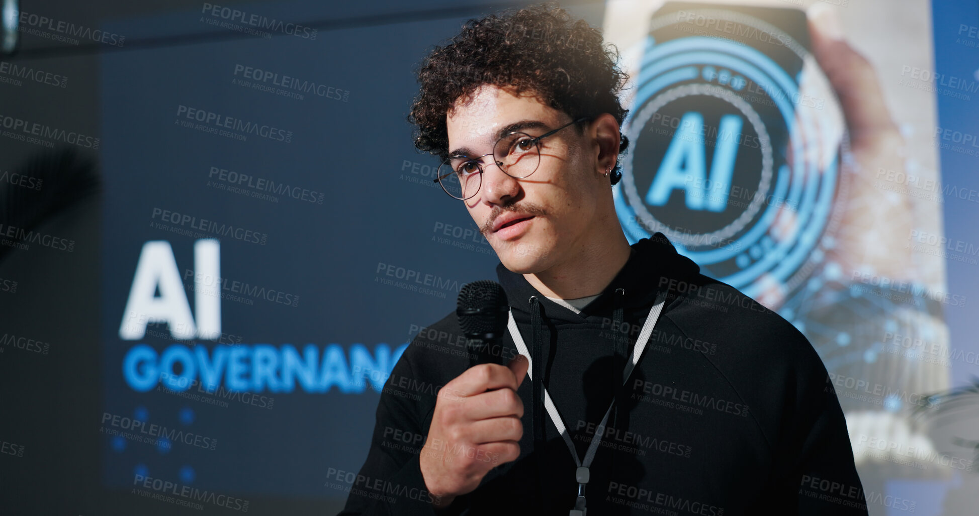 Buy stock photo Man, microphone and programmer with speech at conference for AI governance, ethics or rules. Talk, keynote speaker and person at convention for compliance, policy guidelines or presentation at summit