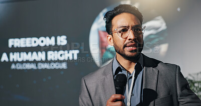 Buy stock photo Man, speaker and mic at conference event of conflict, freedom and human rights speech. Person, public speaking and raise awareness for global oppression, stop injustice and action for Palestine peace