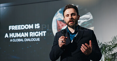 Buy stock photo Man, presentation and human rights at convention on stage for talk, freedom or info at event. Person, public speaking and discussion at global conference for equality, accountability or peace in Gaza