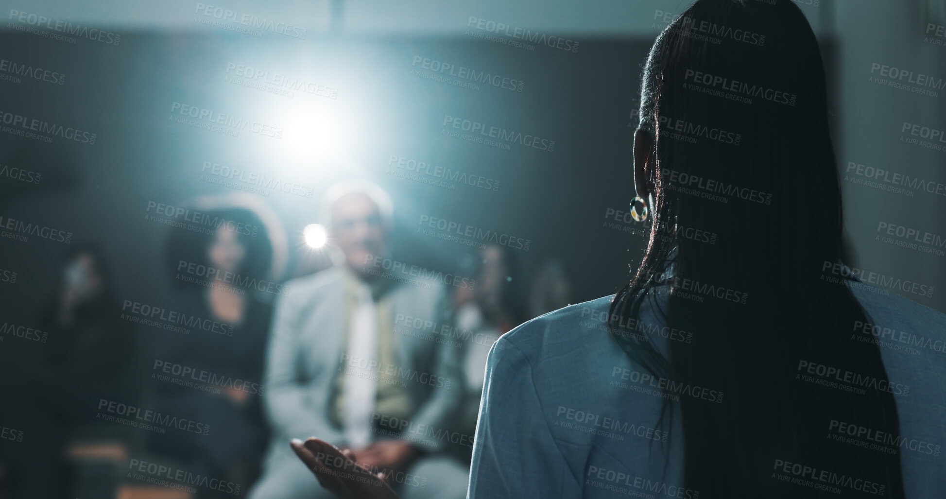 Buy stock photo Woman, back of speaker or presentation for press conference, development seminar or business event. Audience, speech and workshop for economy talk in auditorium with presenter, keynote and summit