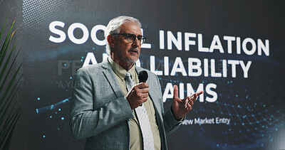 Buy stock photo Mature, businessman and presentation with mic at seminar for liability convention or inflation. Man, executive or speaker with speech for business tradeshow, corporate workshop or talk at summit