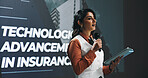 Business woman, presentation or seminar with mic or tablet for speech or convention at workplace. Female person, presenter or speaker with technology for online service or insurance at tech summit