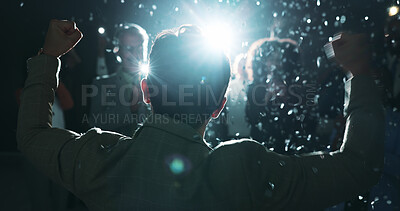 Buy stock photo Business, man and fist pump for success with confetti at award ceremony, celebration and lens flare. Back, person and audience for praise, glitter and congratulations for seminar achievement at night