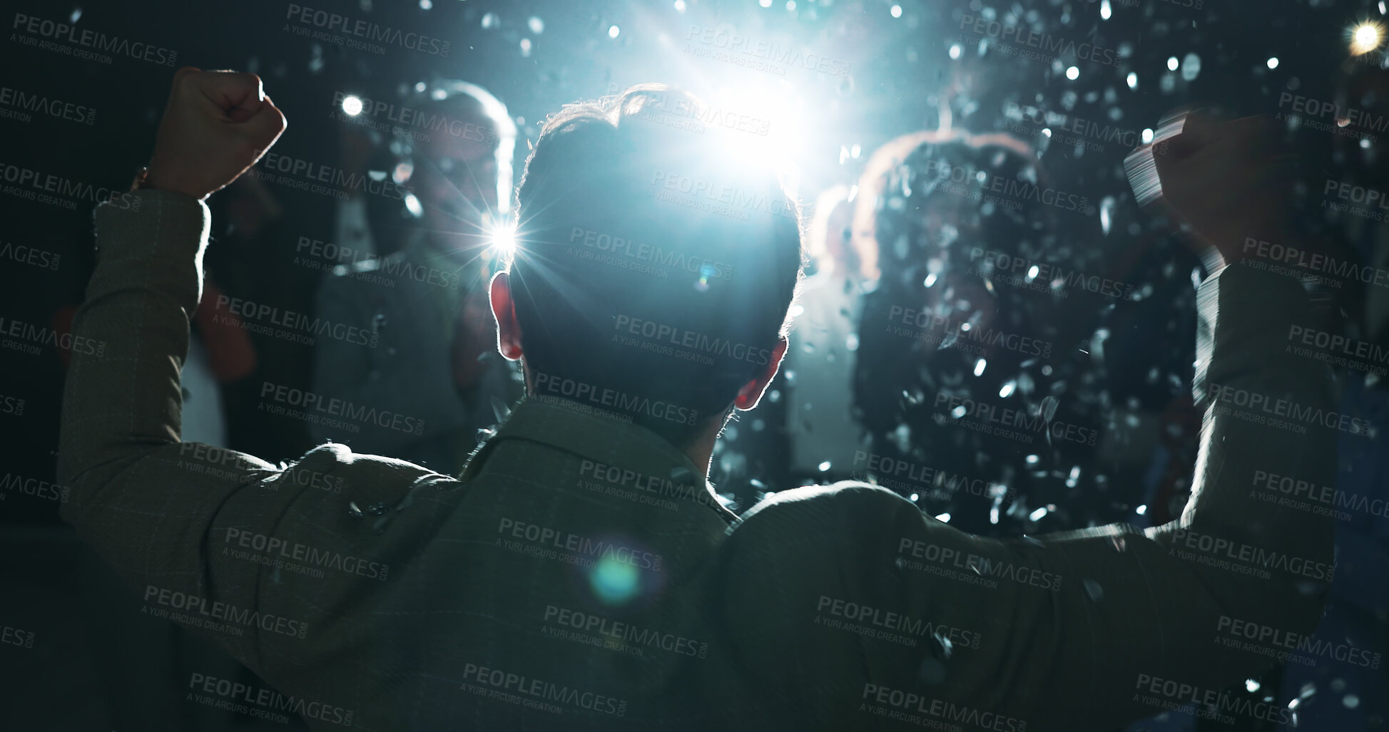 Buy stock photo Business, man and fist pump for success with confetti at award ceremony, celebration and lens flare. Back, person and audience for praise, glitter and congratulations for seminar achievement at night