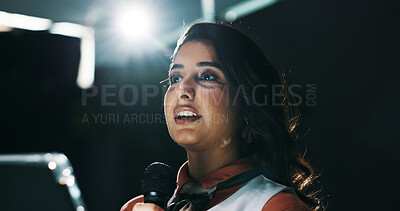 Buy stock photo Microphone, speech and tablet with business woman at symposium for announcement or development. App, event and stage with happy Indian speaker in auditorium for coaching or training conference
