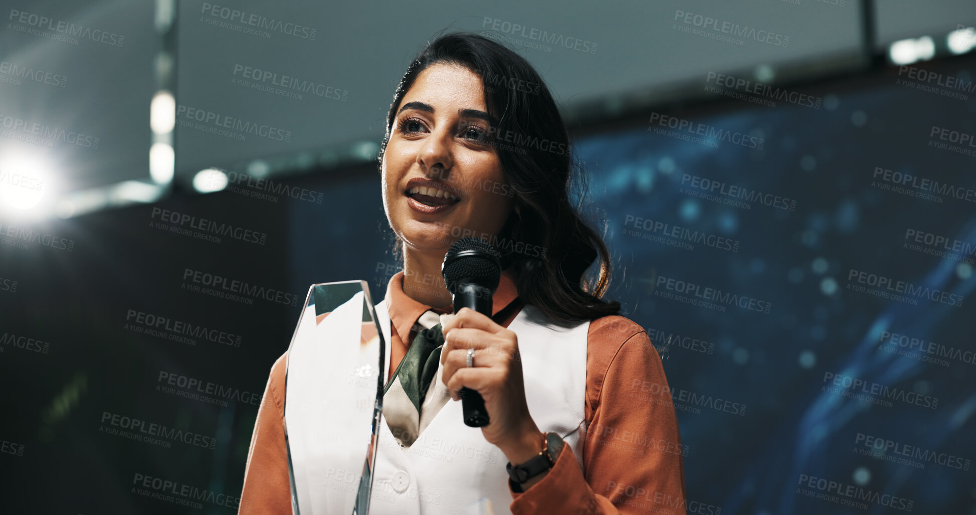 Buy stock photo Happy woman, speech and award with mic for thank you, announcement or congratulations at seminar. Female person, employee or business speaker with smile or trophy for winning at reward ceremony