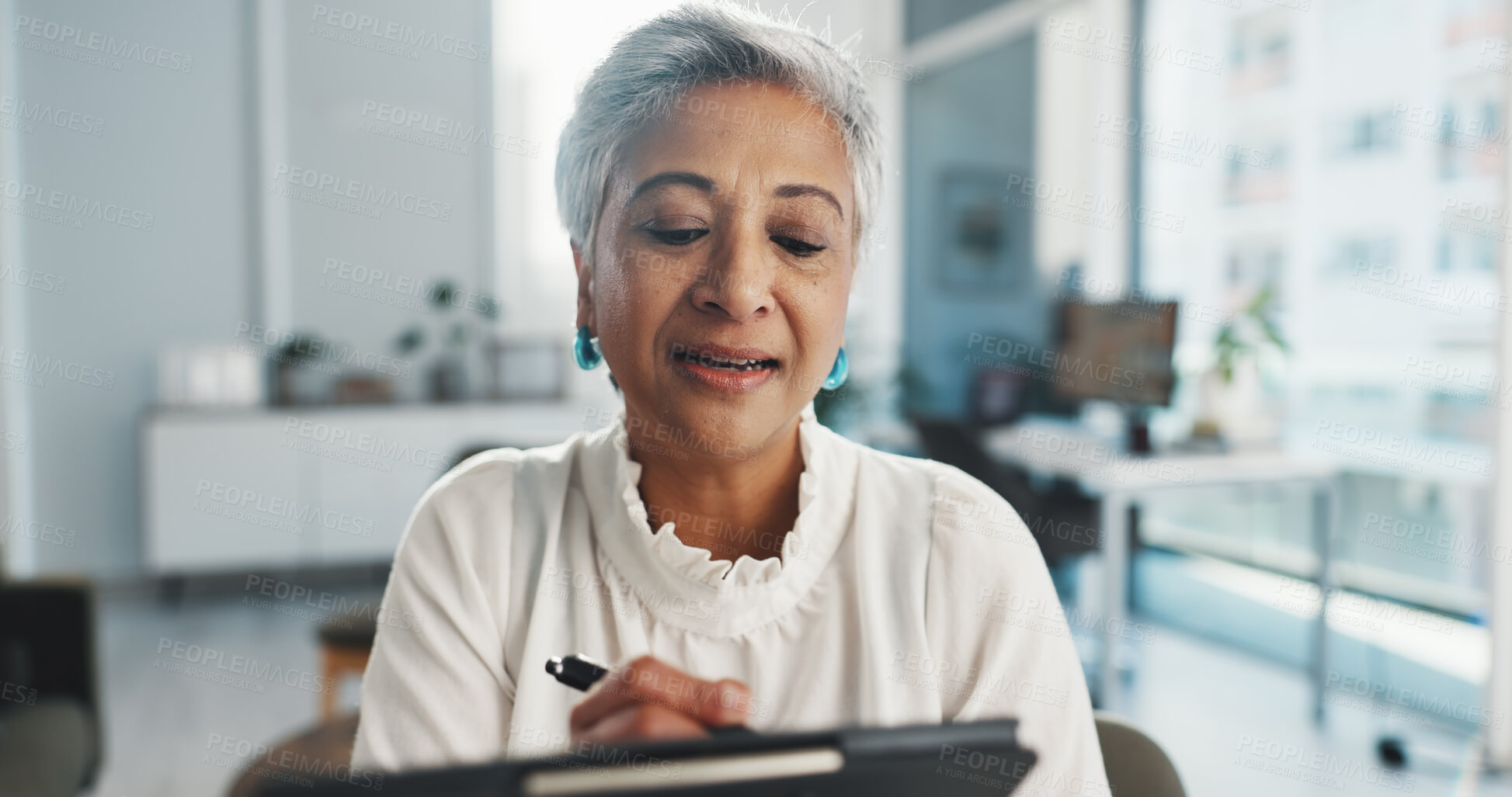 Buy stock photo Video call, writing and psychologist with woman in office for virtual counseling, help and appointment. Mental health session, telehealth and online guidance with mature person in clinic for advice