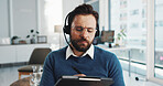 Video call, writing and therapy with man in office for virtual counseling, help or appointment. Mental health session, telehealth and online guidance with person in clinic for advice and psychologist