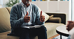Therapy, clipboard and hands of psychologist on sofa for counseling, assessment and support. Mental health, advice and progress with people in office for therapist session, trauma recovery and help