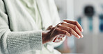 Senior person, hands or wrist pain with injury for muscle tension or arthritis at hospital checkup. Closeup, elderly and patient with sore arm, joint inflammation or carpal tunnel syndrome at clinic