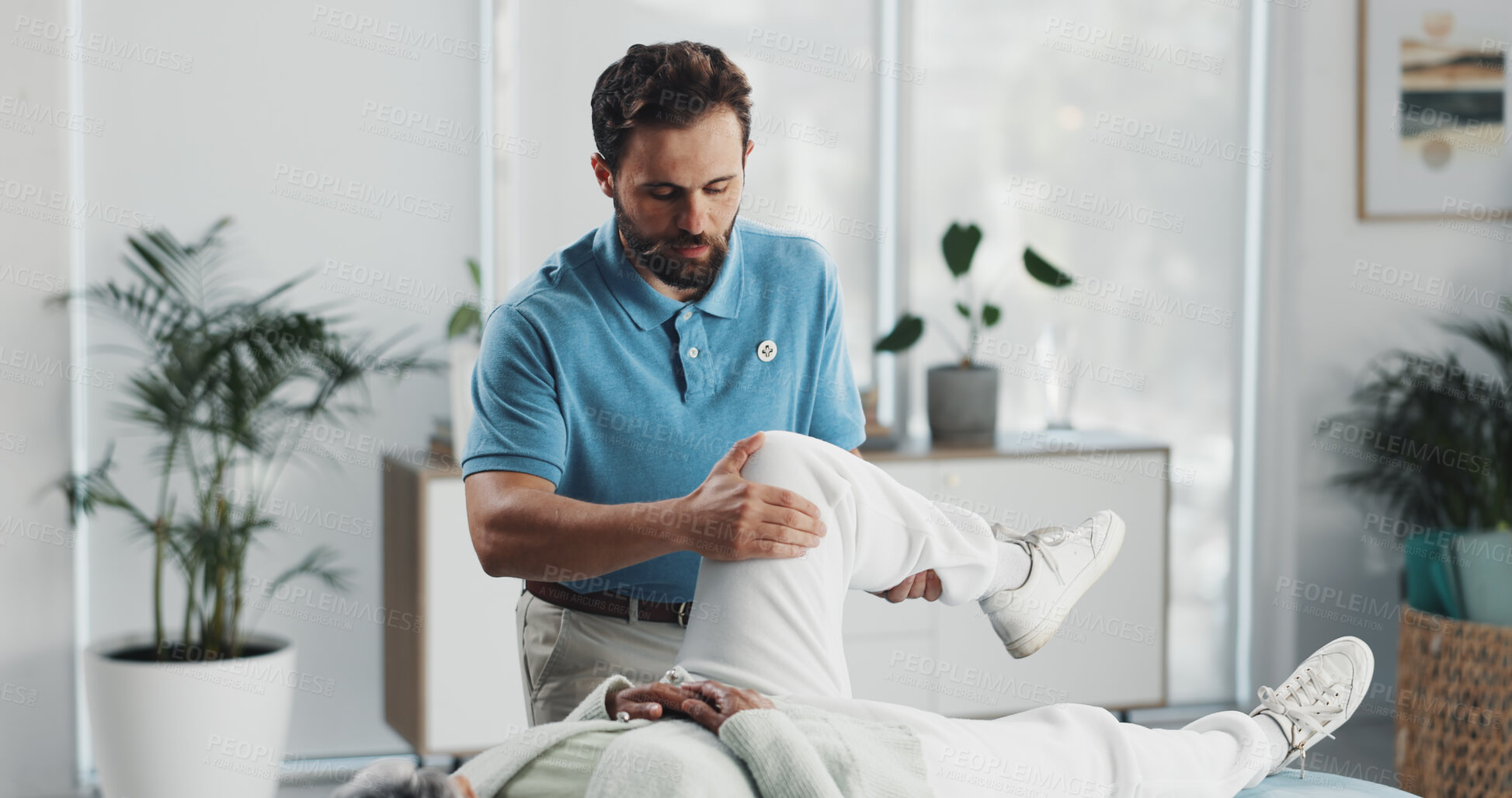 Buy stock photo Physiotherapist, man and patient with stretching legs for injury, healing and care for wellness. People, recovery and support with guide, advice and help for knee pain, arthritis for rehabilitation