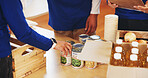 Food, help and hands of volunteers with donation for community service, social project or charity. Groceries, giving and NGO workers with collaboration for distribution of canned goods for outreach.