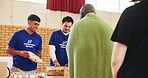 Food, help or volunteering with donation for homeless person, social project or community relief. Charity, group or happy people giving groceries for humanitarian aid, distribution or support at NGO
