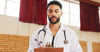 Buy stock photo Doctor, clinic and man writing on clipboard for health, notes and insurance registration. Medical worker, checklist and serious professional with wellness report, results and information in hospital