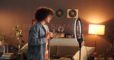 Buy stock photo Man, influencer and fashion with ring light at house for introduction, late live stream and social media. Night, content creator and review outfit for audience, recording video and styling tips