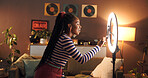 Black woman, influencer and phone with ring light at house of post, live streaming and social media. Female person, content creator or online advice for audience, filming video and broadcast tutorial