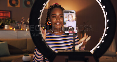 Buy stock photo Black woman, influencer and phone with ring light at house for introduction, late live streaming or social media. Night, content creator and wave to audience, filming video or vlog tutorial with tips