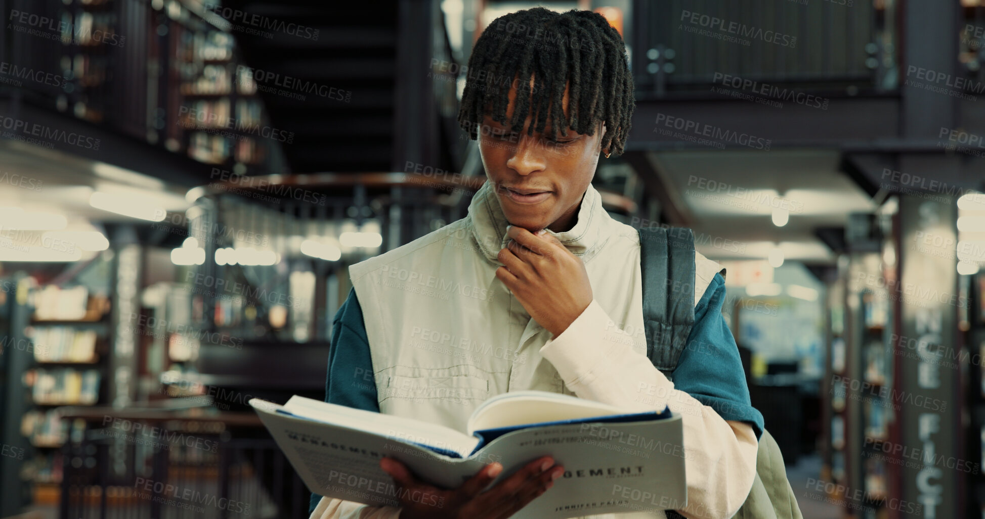 Buy stock photo Library, black man and student with thinking for book, studying information and reading on campus. College, person and course at academy for business management, education and textbook for learning