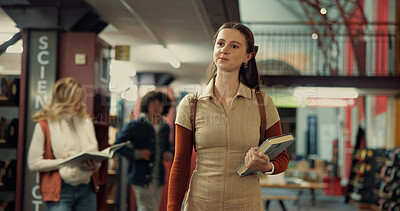 Buy stock photo Book, ideas and woman student in library with planning for studying with university exam at campus. Friends, walking and person brainstorming with literature for college test, project or assignment.