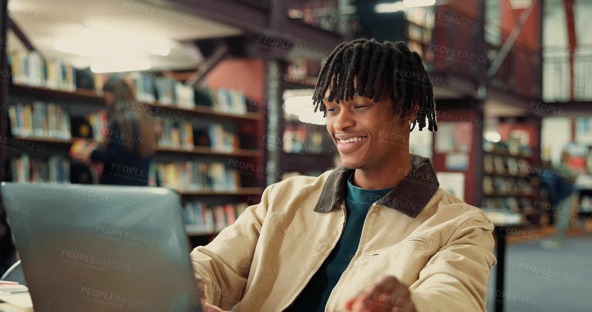 Buy stock photo University, happy and man on laptop in library for online assignment, studying and test results. College, academy and student on computer for research, education and learning resources on campus