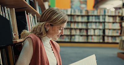 Buy stock photo Student, textbook and girl in library with reading, assignment or thesis research by bookshelf. Information, studying and person with education, prepare for exam or learning on university campus