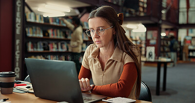 Buy stock photo Student, serious woman and laptop in library for education, learning or accounting course in college. University, computer and girl on internet to research assignment, study knowledge or scholarship