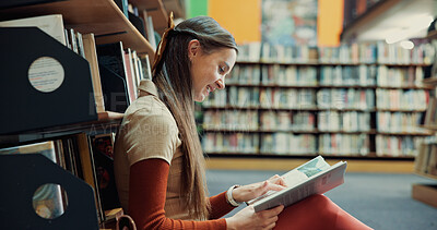 Buy stock photo Library, student and reading book with smile for education, research and knowledge in university. Campus, person and woman with studying for thesis, literature and novel page with learning for test